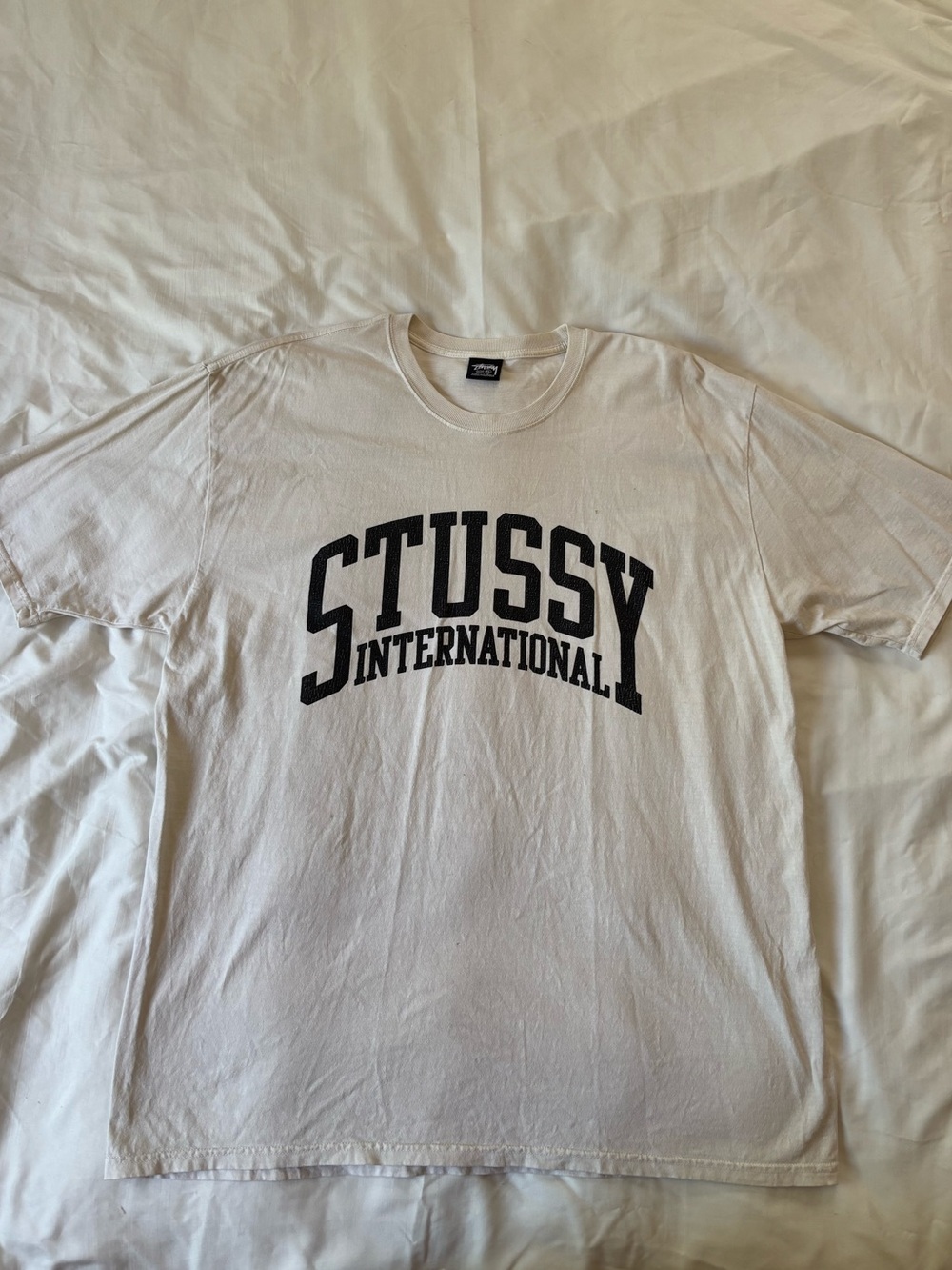 Stussy White Tee with Black 'Stussy International' Arch Logo
